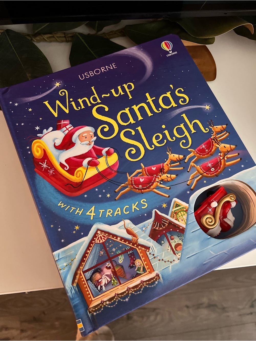 Usborne Wind-up Santa's Sleigh Book and holiday finger puppet books